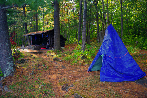 Two Survival Bushcraft Shelters A Teepee And A Leanto In The Adirondack Wilderness Of Upstate New York Stock Photo - Download Image Now - iStock